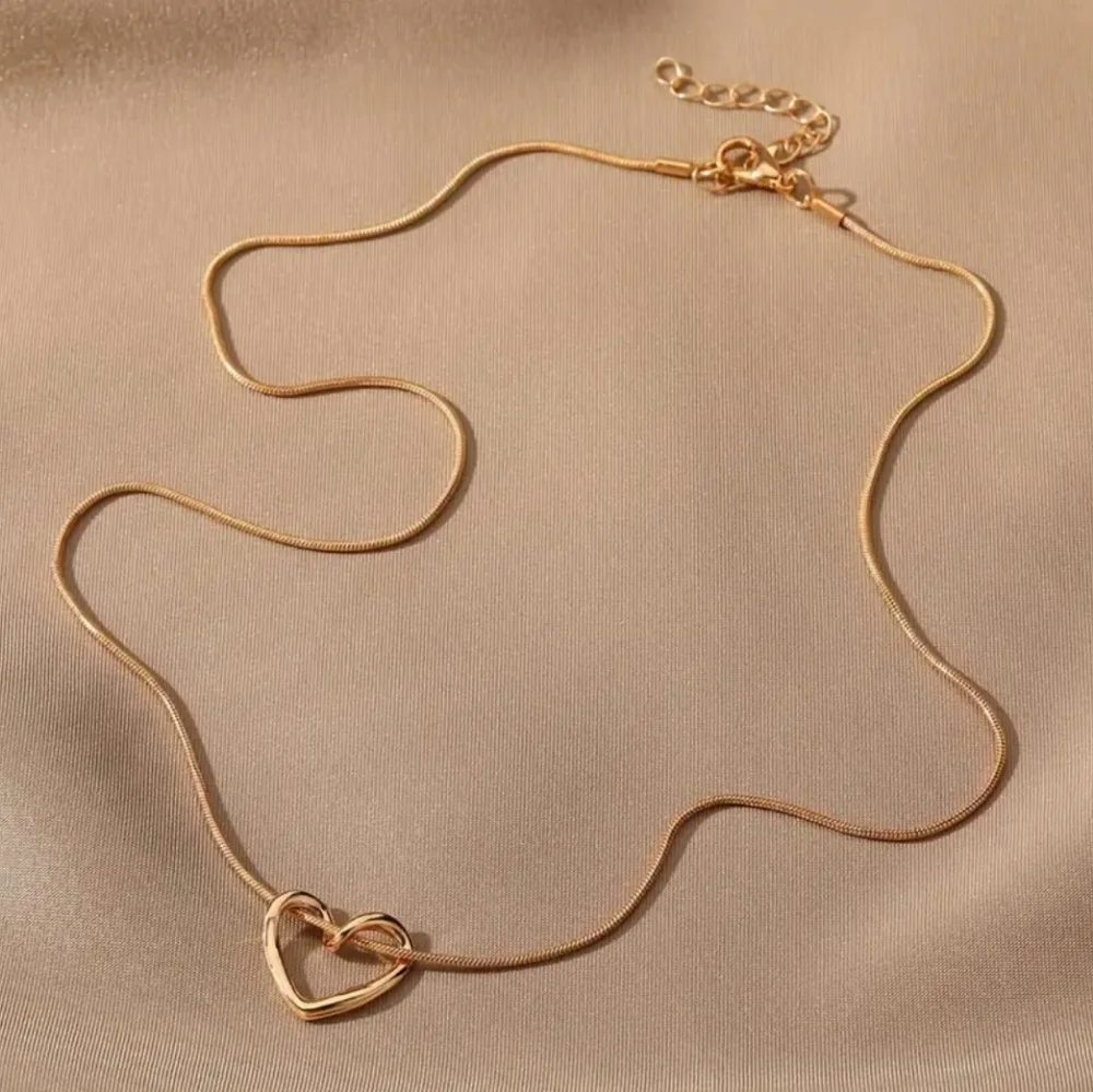 Gold Hollow Heart Pendant Necklace - Picture 3 of 5